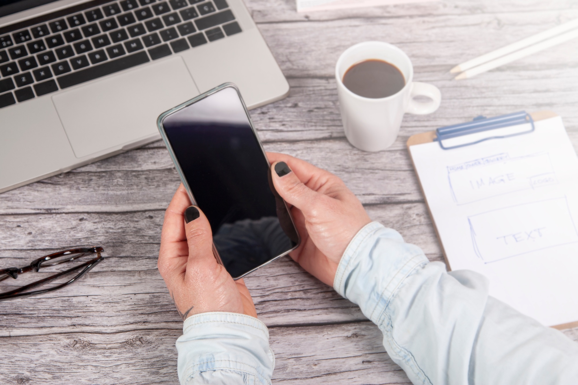 Designer's desk with responsive web design concept.